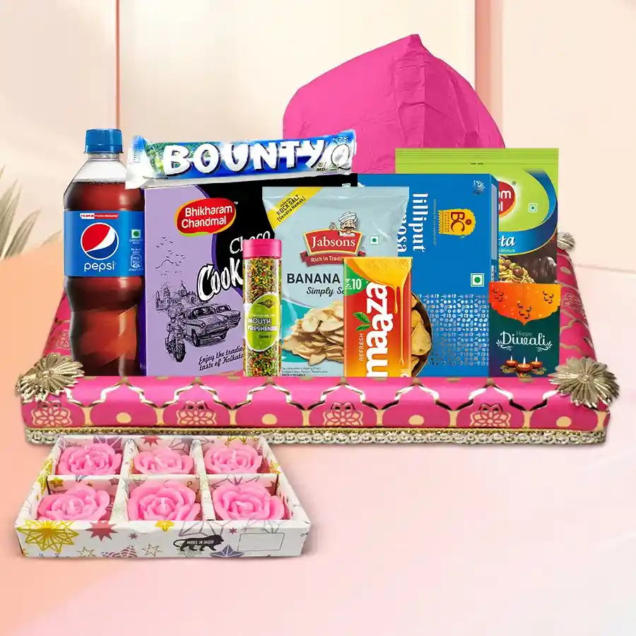 Exclusive Diwali Celebration Gift Hamper featuring Bhikaram cookies, mini samosas, Jabson banana chips, Mazza, Pepsi, Bounty chocolates, mouth fresheners, a Diwali card, a flying lantern, decorative wax candles, and a stylish tray.
