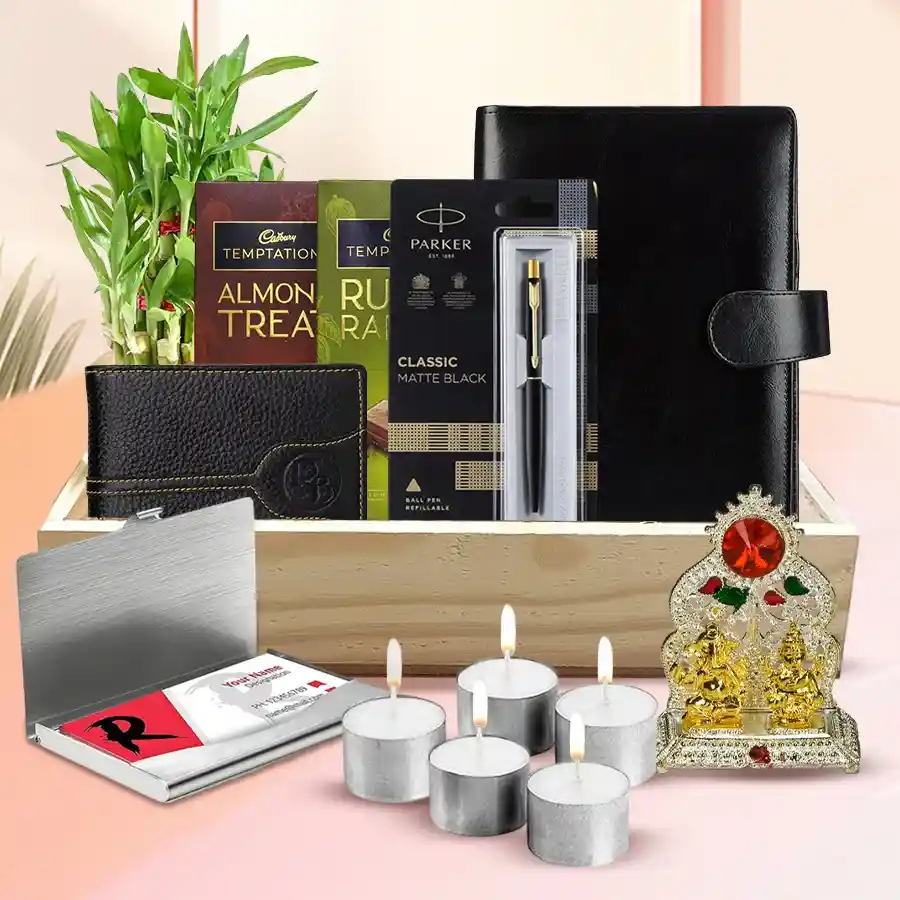 Wonderful Gifts Hamper for Diwali Celebration featuring Cadbury chocolates, a Planner Diary, a Parker pen, a leather wallet, a Lucky Bamboo plant, an Antique Ganesh-Laxmi mandap, tea light candles, a visiting card holder, and a wooden tray.