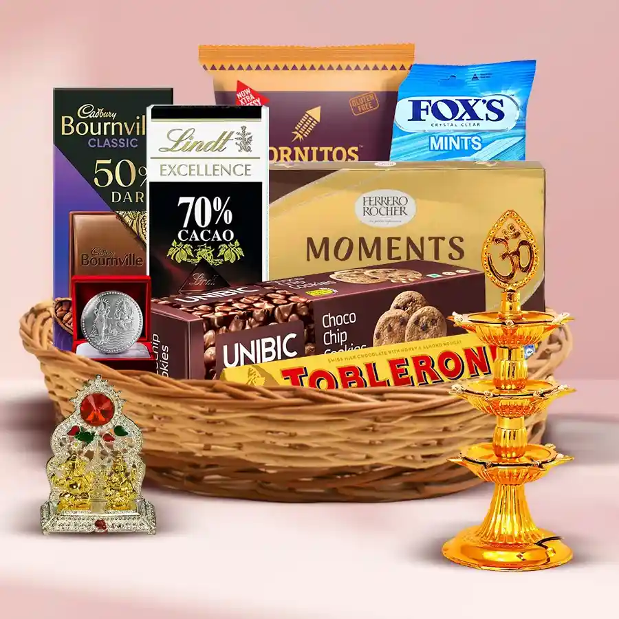 Exquisite Deepawali Special Gift Hamper featuring chocolates, cookies, nachos, decorative items, and a greeting card