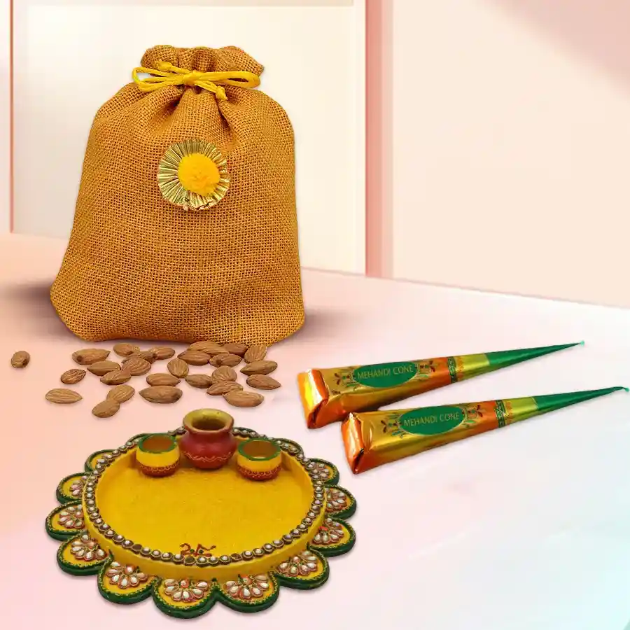 Karwa Chauth Sargi Pooja Thali set with Mehndi cones and almonds in a stylish potli