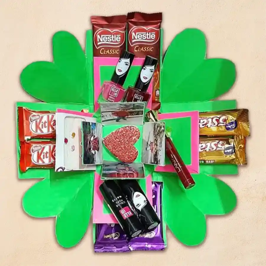 Triple Layer Explosion Box filled with chocolates, cosmetics, and personalized photos.