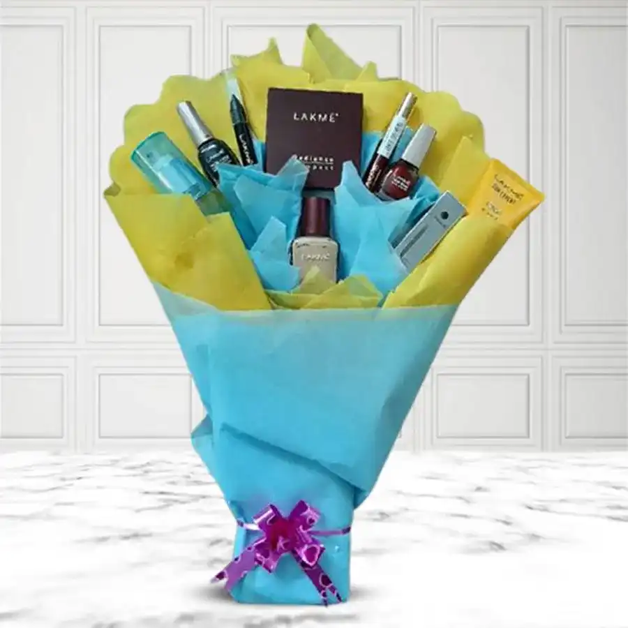 Lakme Makeup Cosmetics Bouquet with maroon nail polish, lipstick, black kajal, eyeliner, foundation, compact, sunscreen lotion, sindoor, and makeup remover arranged in a gift box