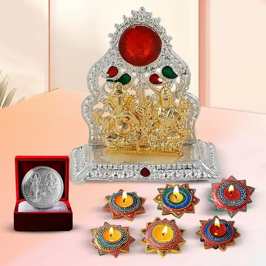 Auspicious Ganesh Laxmi Mandap gift hamper featuring an ornate mandap, six designer Dot Mandala Art wax candles, and a silver-plated coin, all arranged beautifully for Diwali celebrations.