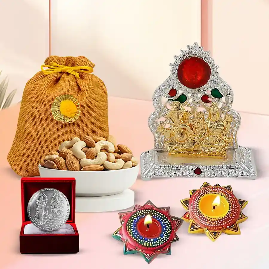 Exquisite Diwali gift set featuring an Antique Ganesh Laxmi Mandap, a designer potli with 200g premium dry fruits, and a pair of handmade Dot Mandala wax candles.