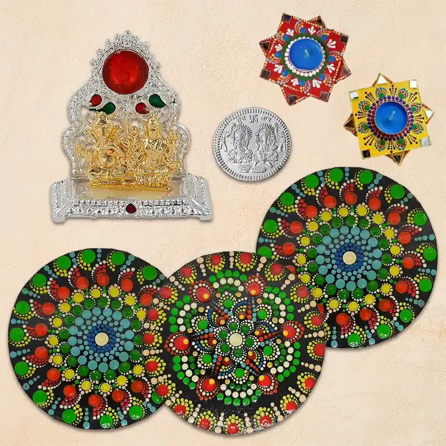 Exclusive Dot Mandala Art Diwali Decor set featuring handmade rangolis, reusable wax diyas, antique Laxmi Ganesh mandap, and a silver-plated Ganesh Laxmi coin.