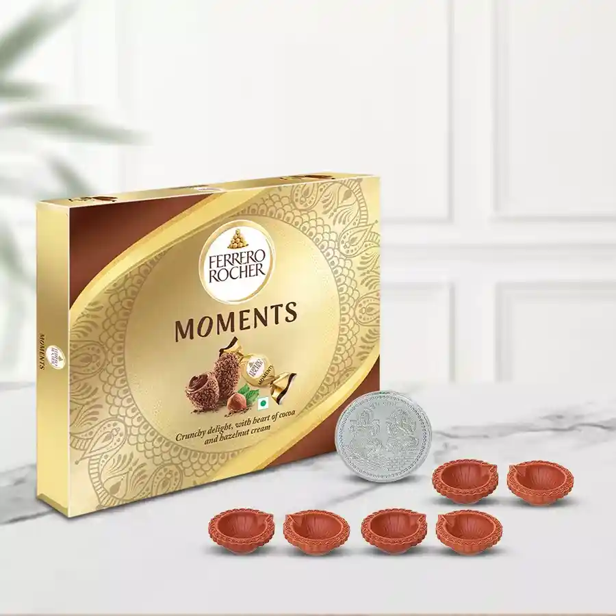 Ferrero Rocher chocolate hamper with diyas and a silver-plated coin for Diwali celebration