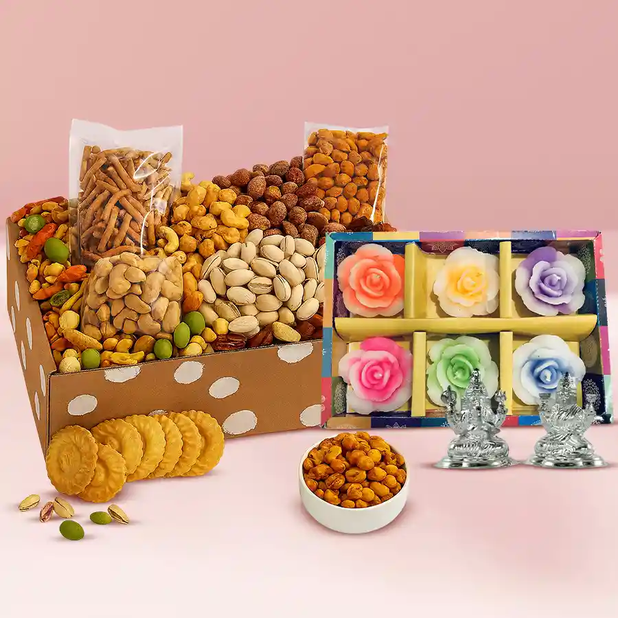 Special Gift Box containing dried fruits, gourmet snacks, silver-plated Ganesh and Lakshmi idols, and wax diyas.