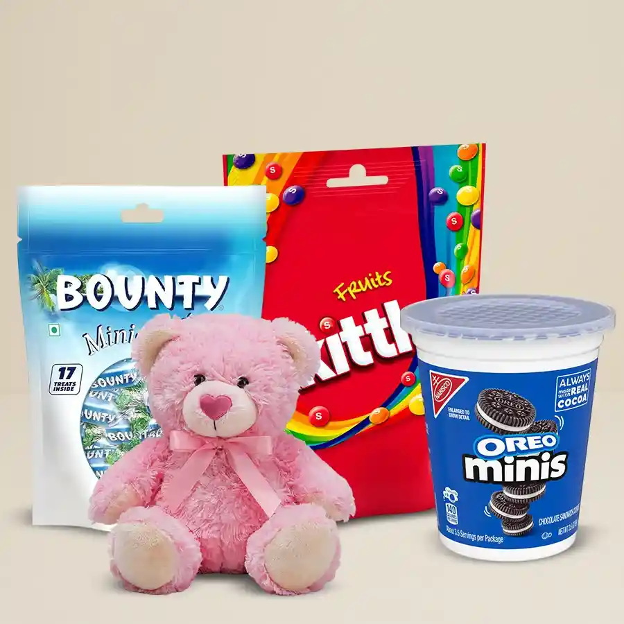 Delightful chocolates and a soft toy for kids with a New Year greeting card