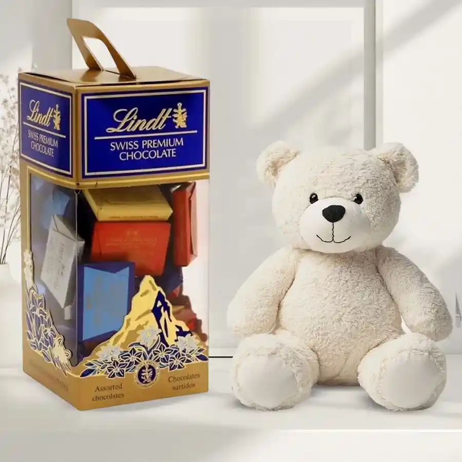 Lindt Swiss chocolates paired with a 6-inch teddy bear, perfect for New Year celebrations.
