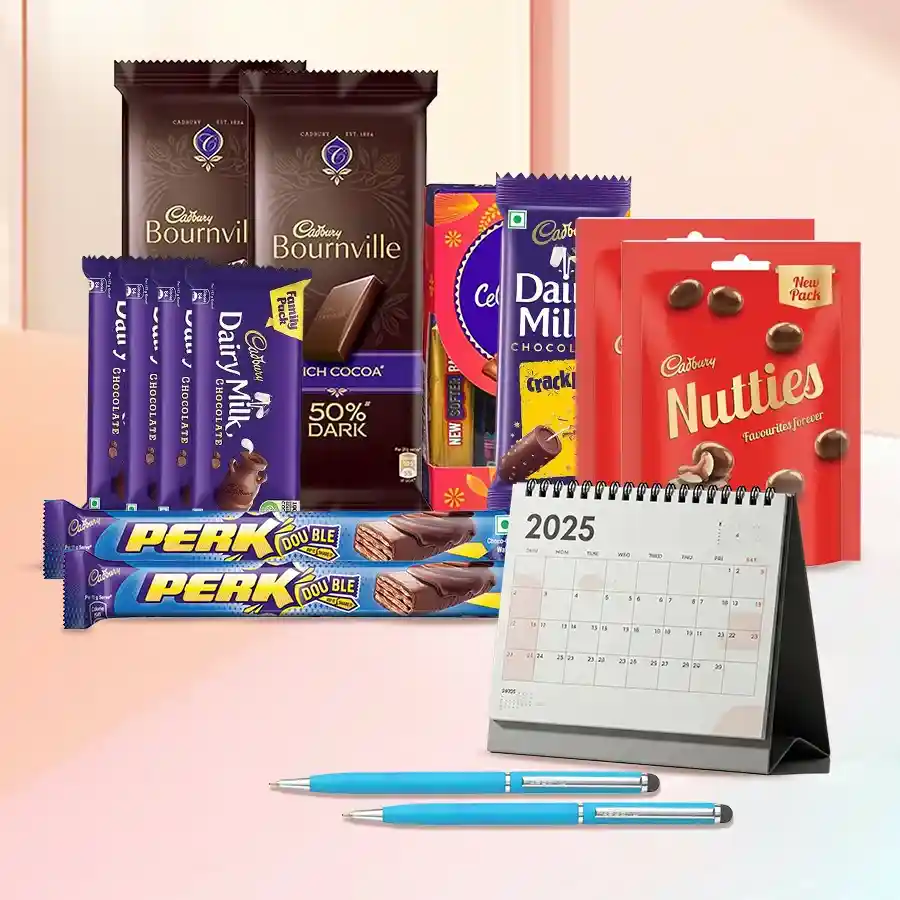 Amusing Chocolates Gift Hamper featuring Cadbury treats, a desk calendar, and stylish ballpoint pens