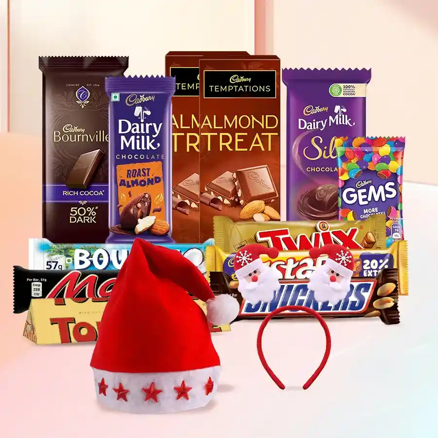 Gift hamper filled with assorted chocolate treats and festive accessories including a LED Santa Claus cap and X-mas LED hairband.