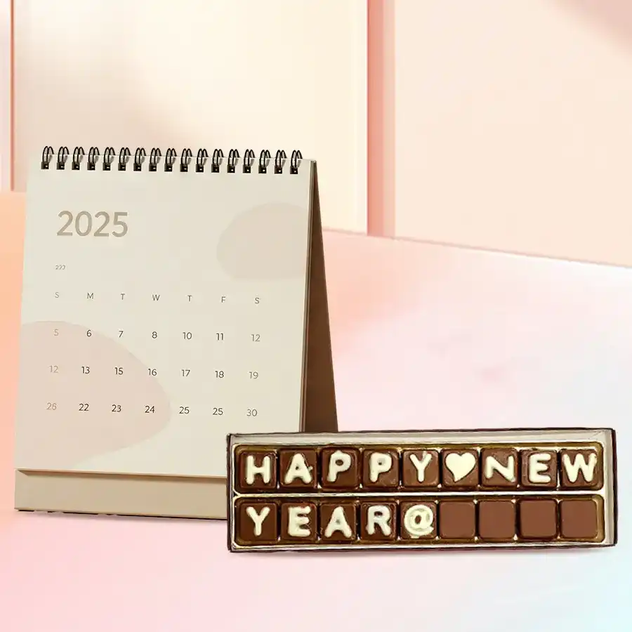 Happy New Year gift featuring chocolate and a desk calendar with a 2-line SMS message.