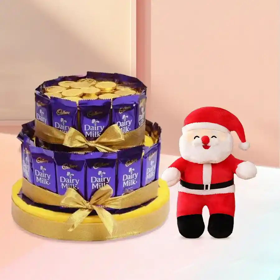Exclusive chocolate arrangement with a jolly Santa Claus soft toy, featuring 25 Cadbury Dairy Milk chocolates, 20 gold coin chocolates, presented on a golden base with a luxurious ribbon.