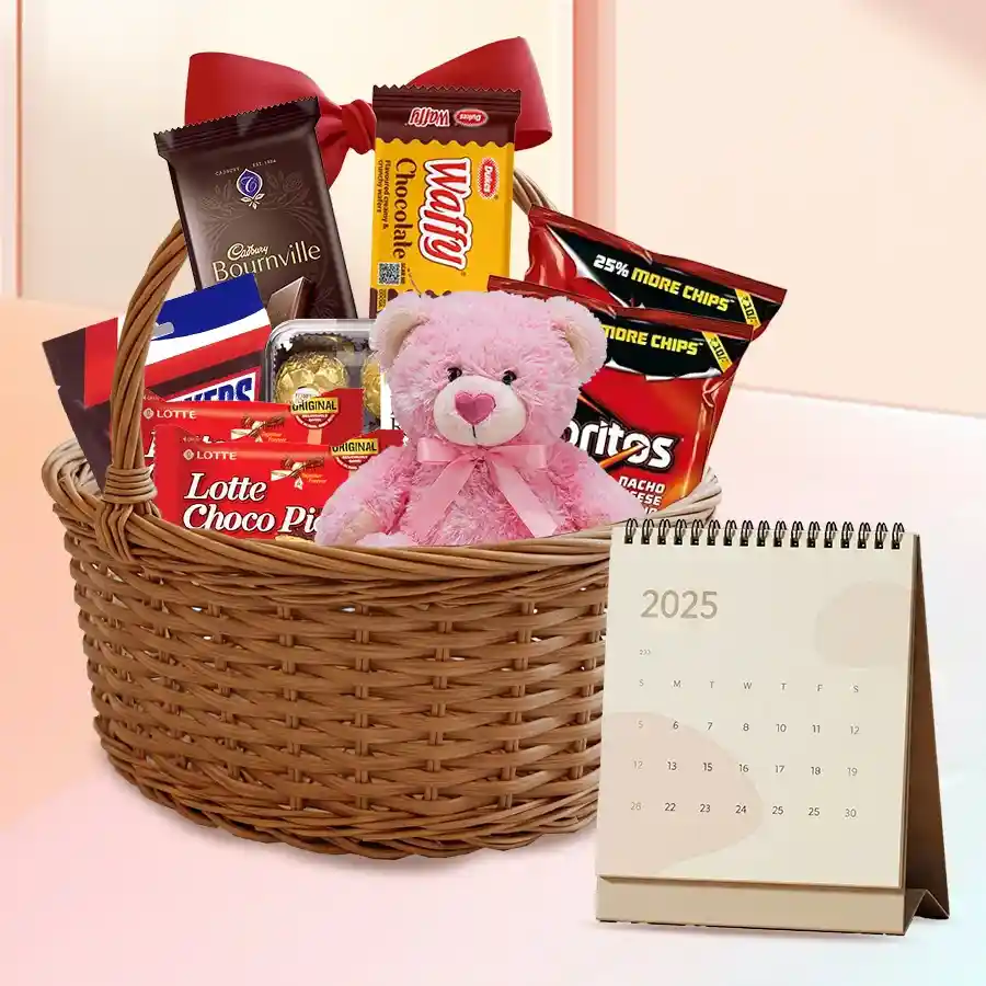 Exquisite Chocos Gift Basket featuring Doritos Nachos, Choco Pies, Ferrero Rocher, Cadbury Bournville bars, Snickers Miniatures, Dukes Chocolate Wafers, a desk calendar, and a teddy bear, elegantly arranged in a basket with a red bow.