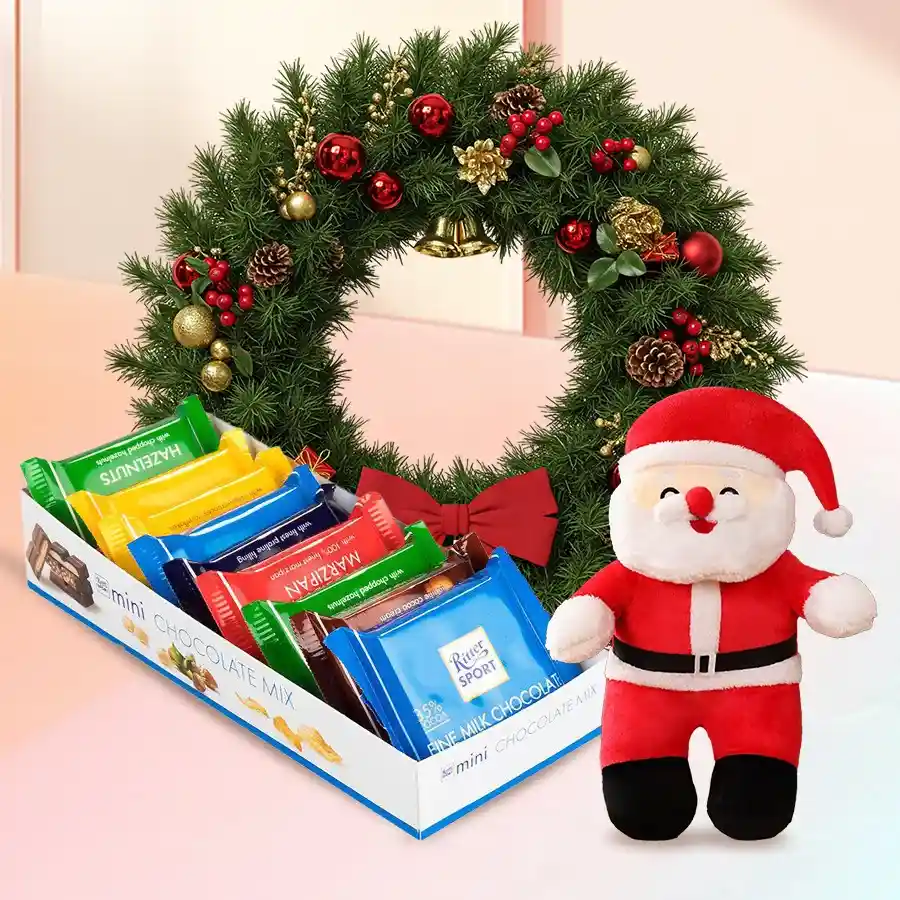 Wonderful Ritter Sport Chocos gift set featuring nine mini chocolates, a 9-inch Santa Claus soft toy, and a beautifully decorated wreath