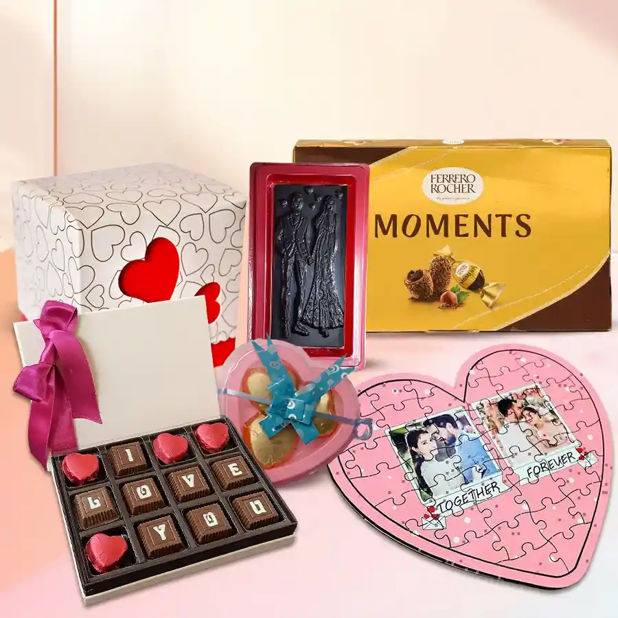 Personalized Valentine's Day chocolate gift combo with heart-shaped puzzle, handmade heart chocolates, "I Love You" message chocolate, Ferrero Rocher Moments, and heart cutout chocolate box.