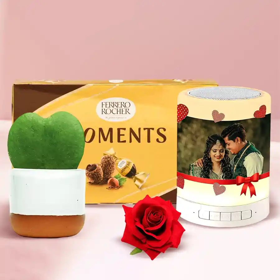 Personalized photo Bluetooth speaker gift set with chocolates, plant, and red velvet rose for Valentine's Day