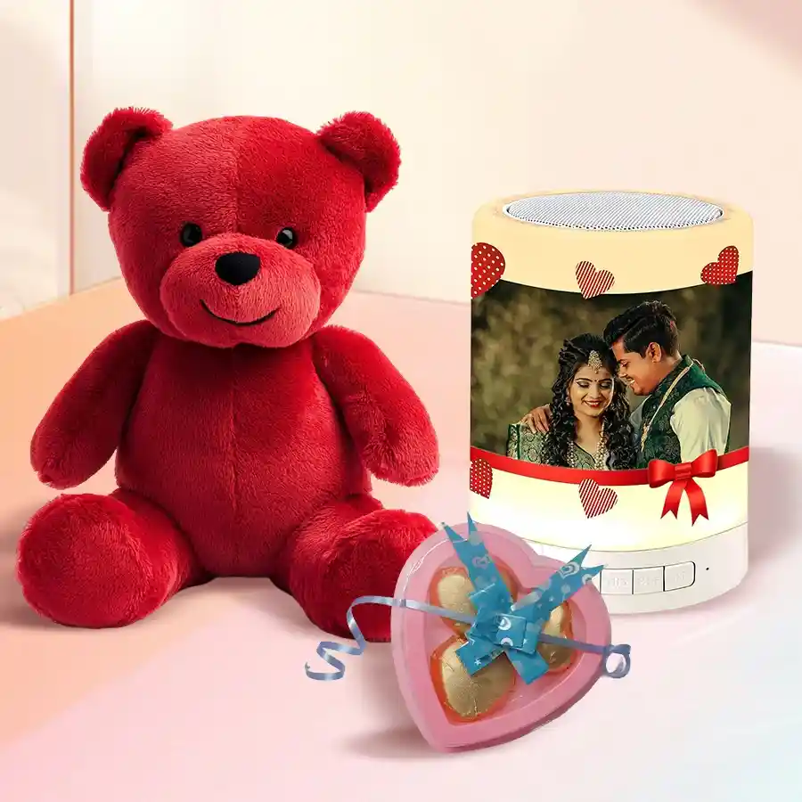 Exclusive Teddy Delight Gift Combo featuring a cuddly red teddy, personalized Photo Bluetooth Speaker, and handmade heart-shaped chocolates