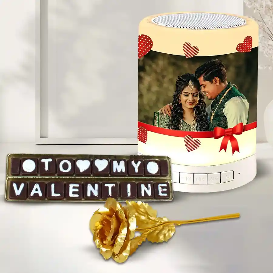 Personalized photo Bluetooth speaker with handmade chocolates and a golden rose for Valentine's Day gift