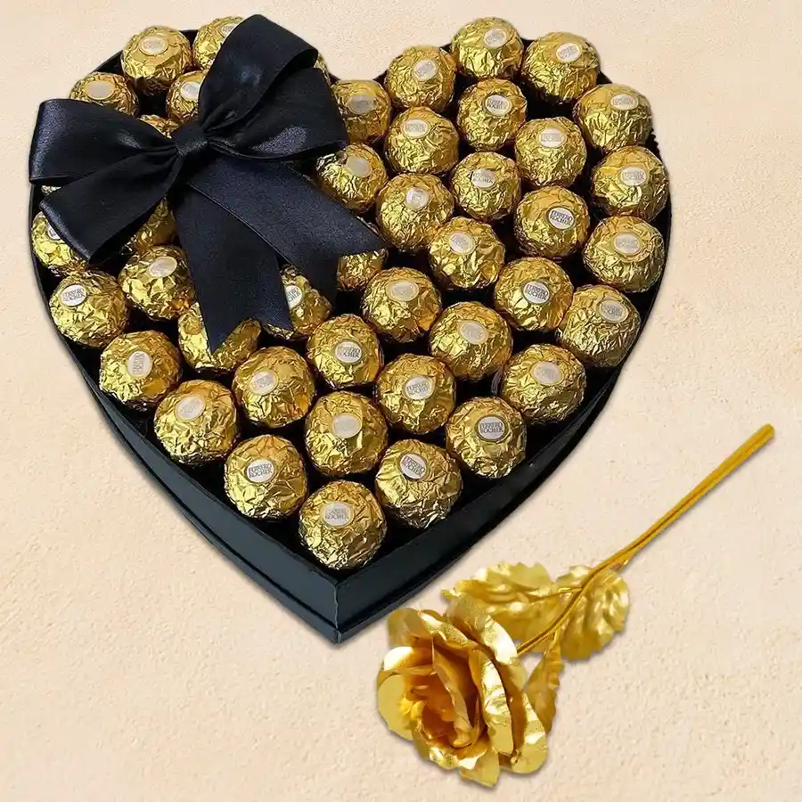 Dazzling Rosy Gift featuring a heart arrangement of 48 Ferrero Rocher chocolates and a golden rose
