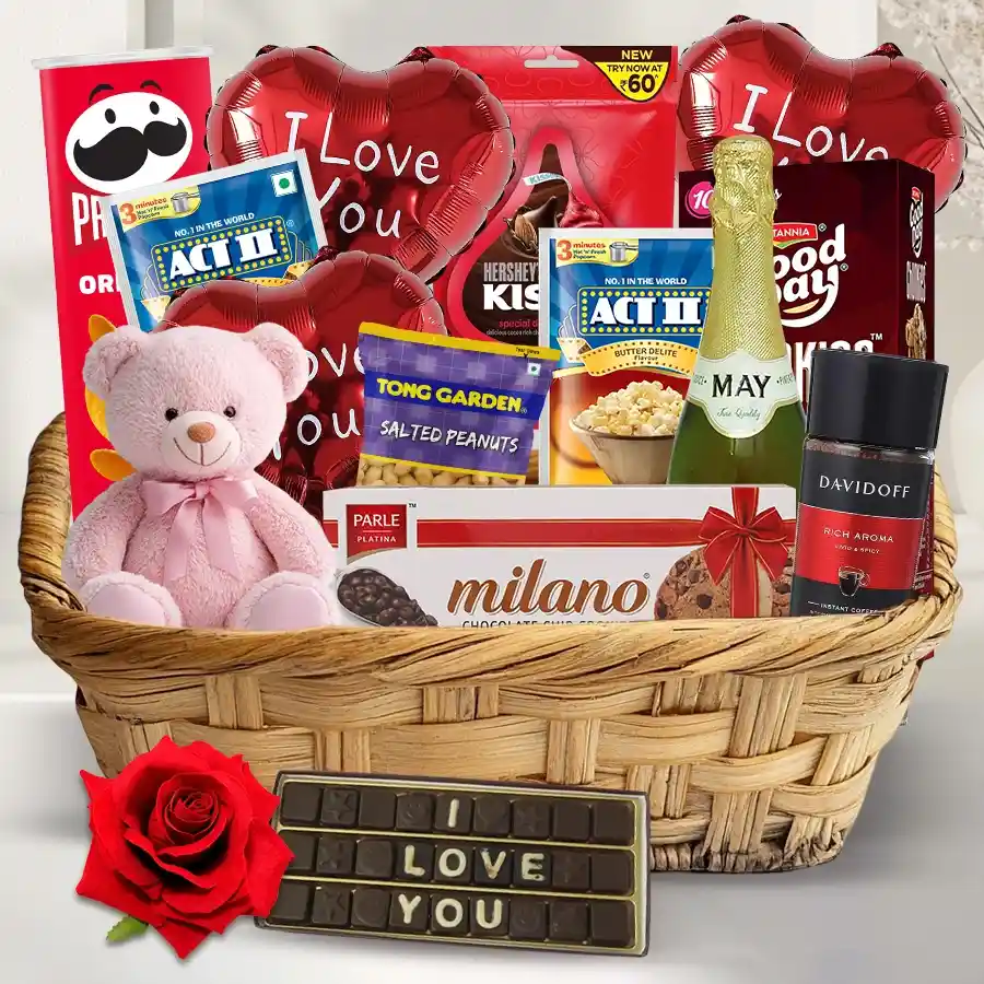 Delightful Gourmet Gift Hamper with sparkling juice, Davidoff coffee, Hershey's chocolates, crunchy snacks, teddy bear, Mylar balloons, and red velvet rose