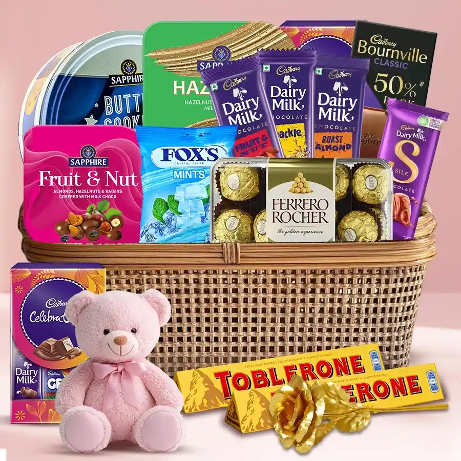 Enticing Chocolate Temptation Gift Basket featuring an assortment of chocolates, a Golden Rose, and a cuddly teddy bear.
