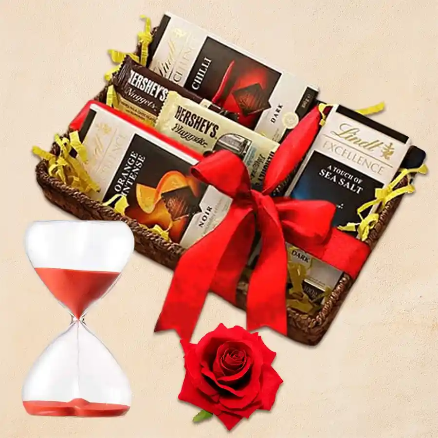 Irresistible Chocolate Treat gift set with Lindt chocolate bars, Hershey's Kisses, a red velvet rose, and a Love Timer for Valentine's Day