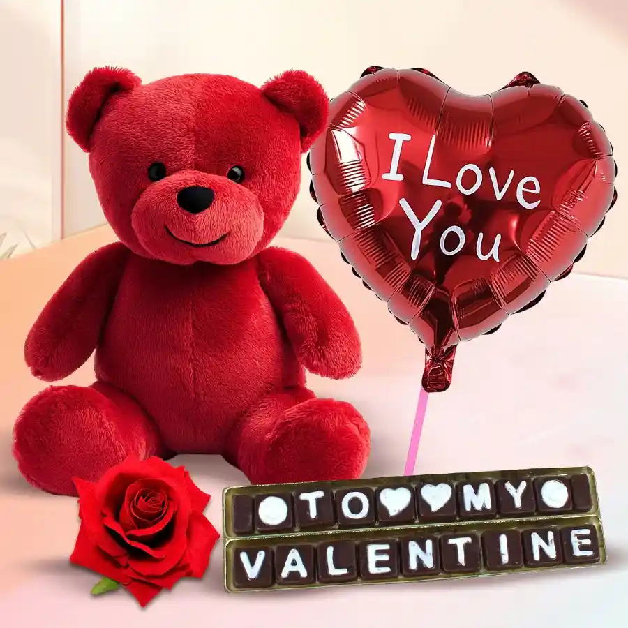 Attractive Propose Day gift combo featuring a red teddy bear, SMS chocolate, 'I Love You' balloon, and red velvet rose.