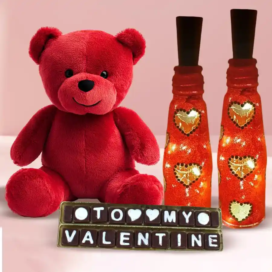 Twin Heart LED lamp, homemade chocolates, and a cute 6-inch teddy bear arranged together as a romantic Propose Day gift.