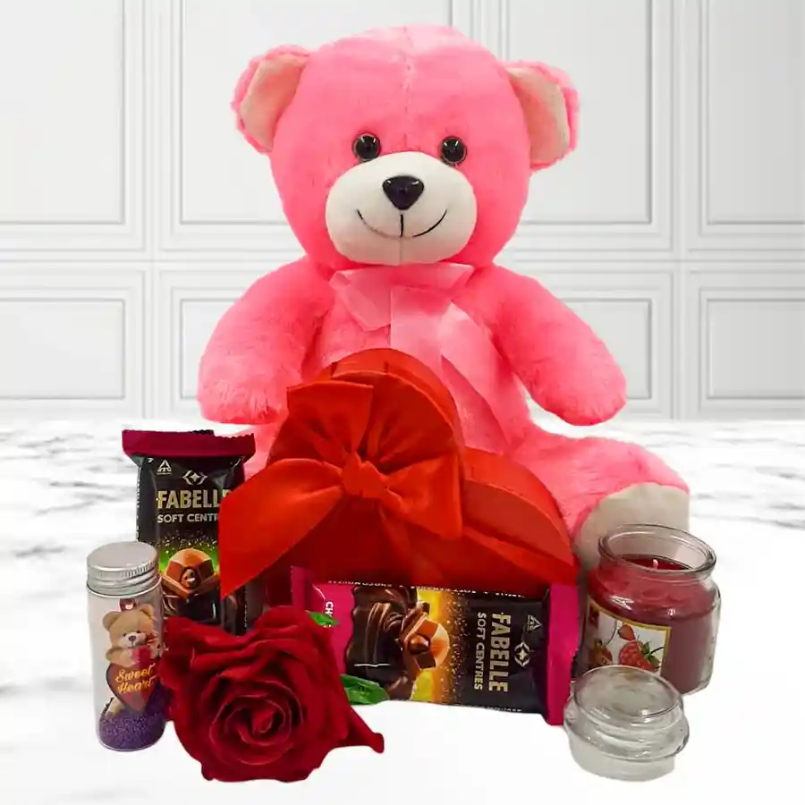 Romantic Date Love Hamper featuring a pink teddy, chocolates, an aroma candle, a Secret Message Jar, a red velvet rose, and a red heart box