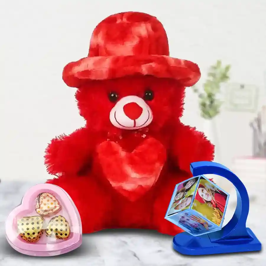Beautiful Personalized Gift Combo featuring a personalized photo magnetic revolving stand, handmade heart-shaped chocolates, and a cute red teddy bear