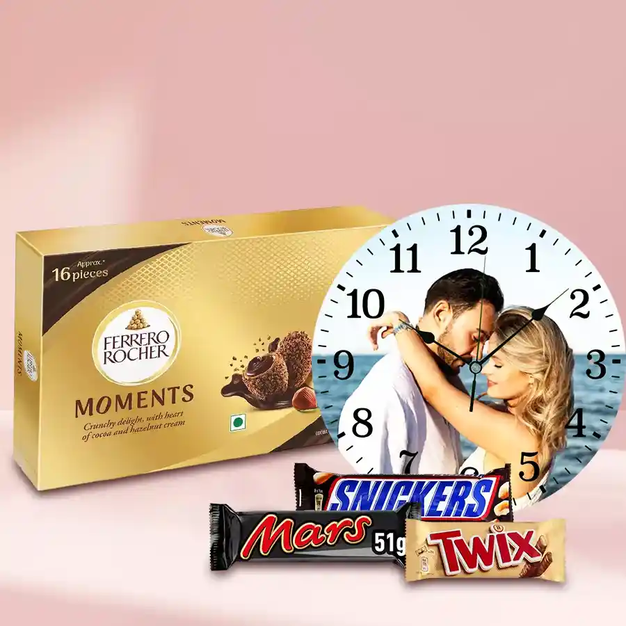Personalized wall clock with a photo and an assortment of imported chocolates including Ferrero Rocher, Snickers, Twix, and Mars bars