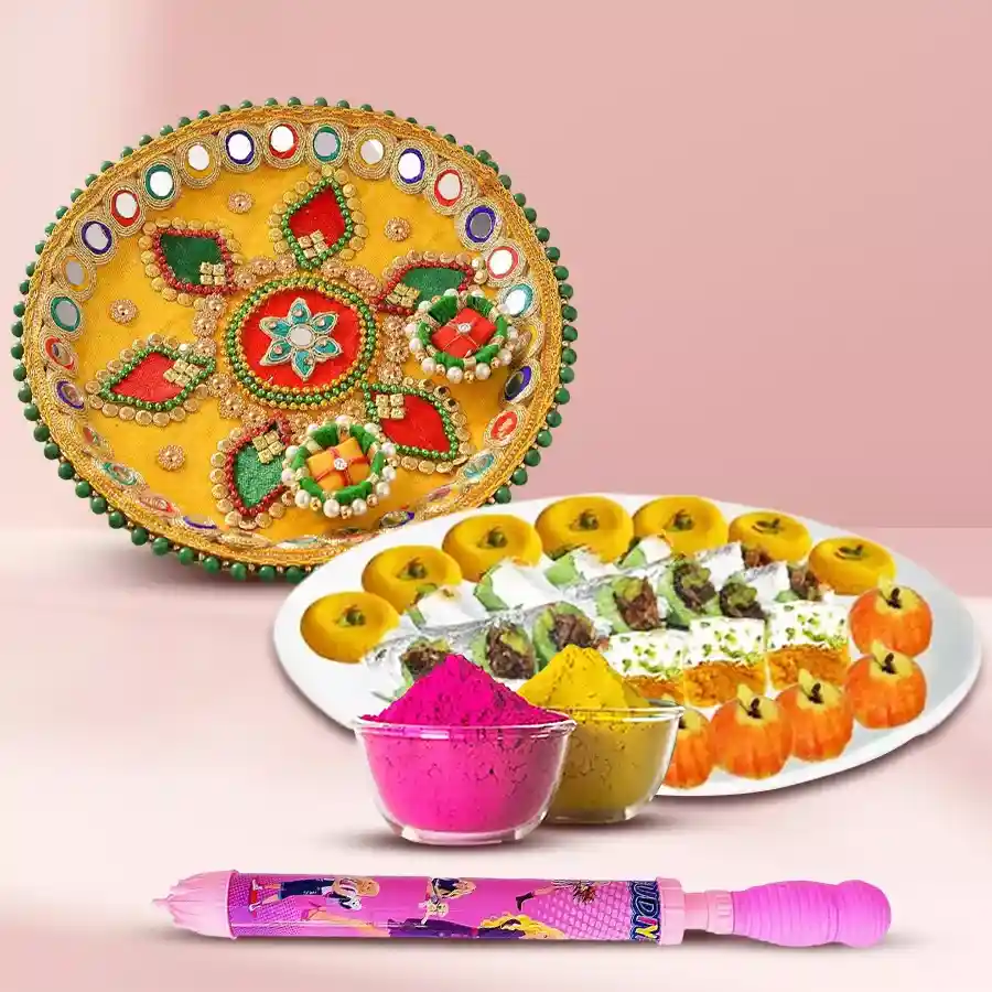 Assorted sweets from Bhikaram in a festive gift box with a Pooja Thali, colorful Pichkari, and multicolor Gulal for Holi celebrations.