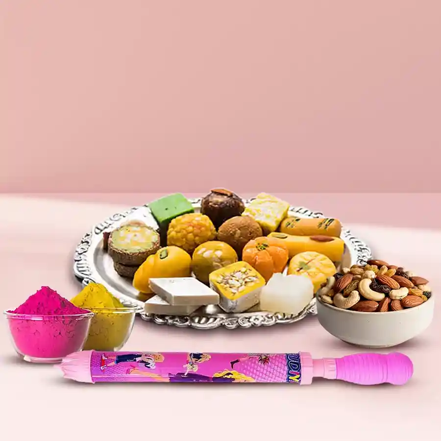 Ambrosial Dry Fruits Potli with mixed sweets from Haldirams for Holi celebration, featuring vibrant pichkari and colorful herbal gulal packets.