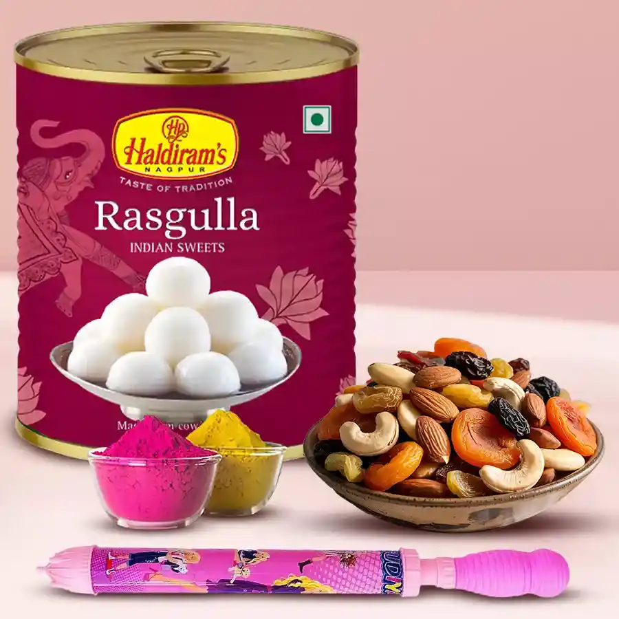 A festive Holi gift combo featuring a bowl of mixed dry fruits, a container of Haldirams Rasgulla, a colorful pichkari, and two packets of herbal gulal, all arranged on a vibrant background.