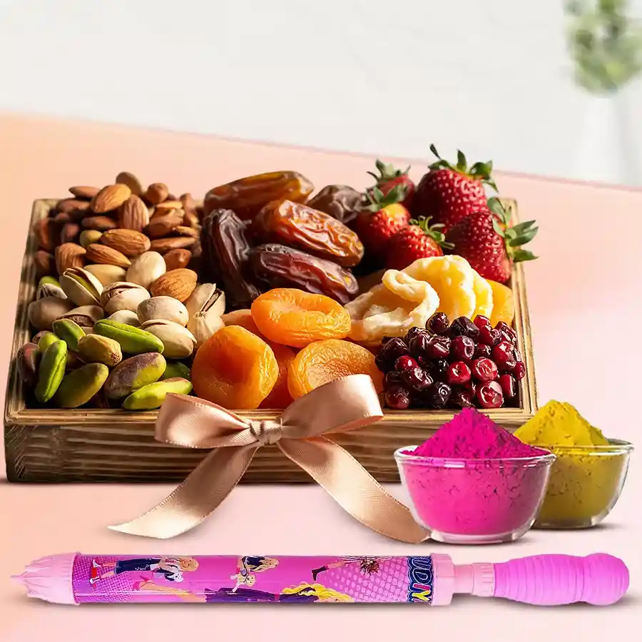Mixed dry fruits tray featuring almonds, pistachios, dry apricots, dates, strawberries, and cranberries, accompanied by a vibrant pichkari and colorful herbal gulal for Holi celebrations.