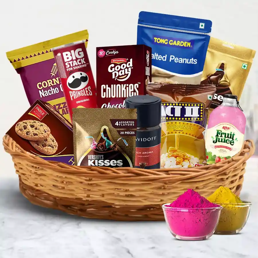 Gift hamper for Holi celebration with fruit juice, snacks, chocolates, cookies, and herbal gulal