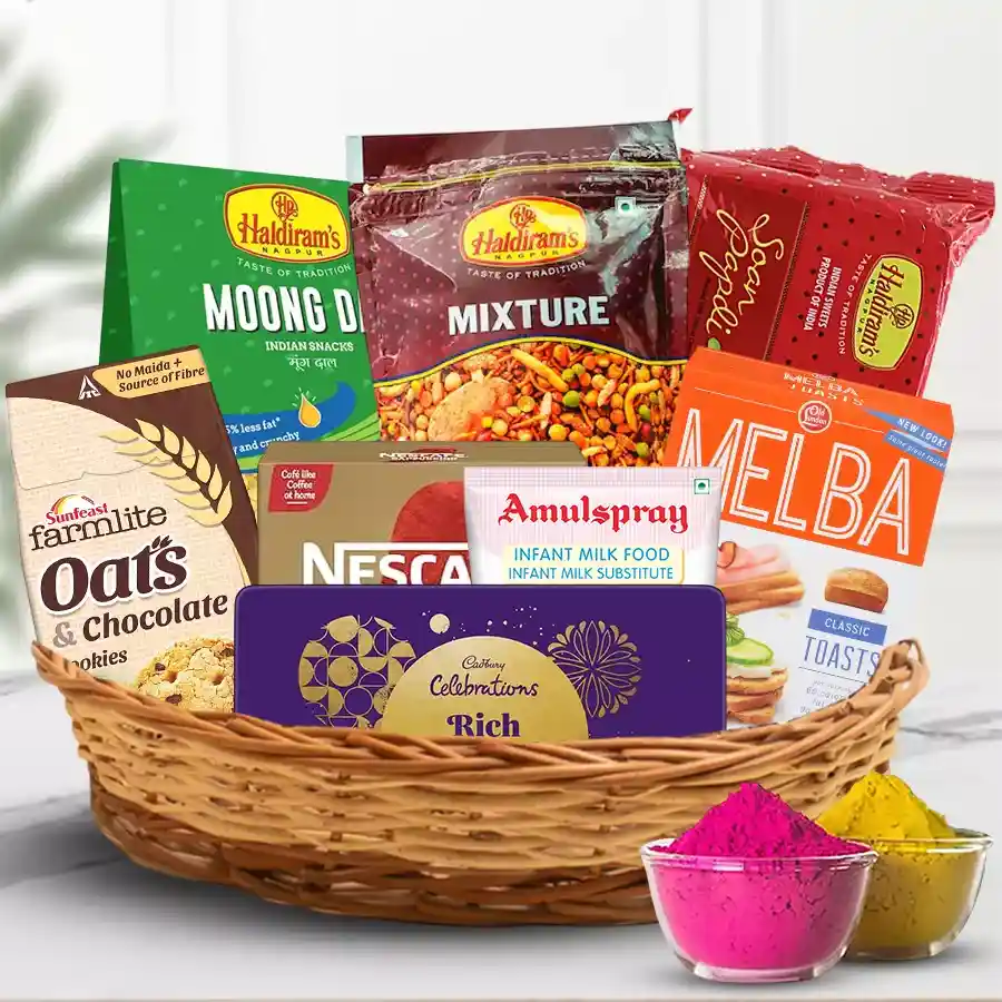 Outstanding Holi gift basket filled with assorted festive treats like Nescafé cappuccino, Amul spray milk, Melba toast, Sunfeast chocolate cookies, Haldiram masala mixtures, sohan papdi, Cadbury dry fruits, and colorful herbal gulal packets, all elegantly arranged in a charming basket.