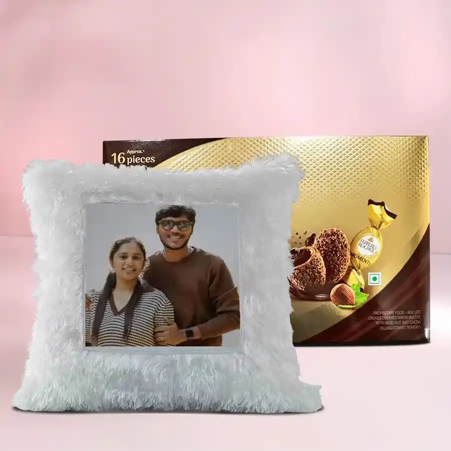 Alluring personalized LED heart fur cushion next to a box of Ferrero Rocher chocolates