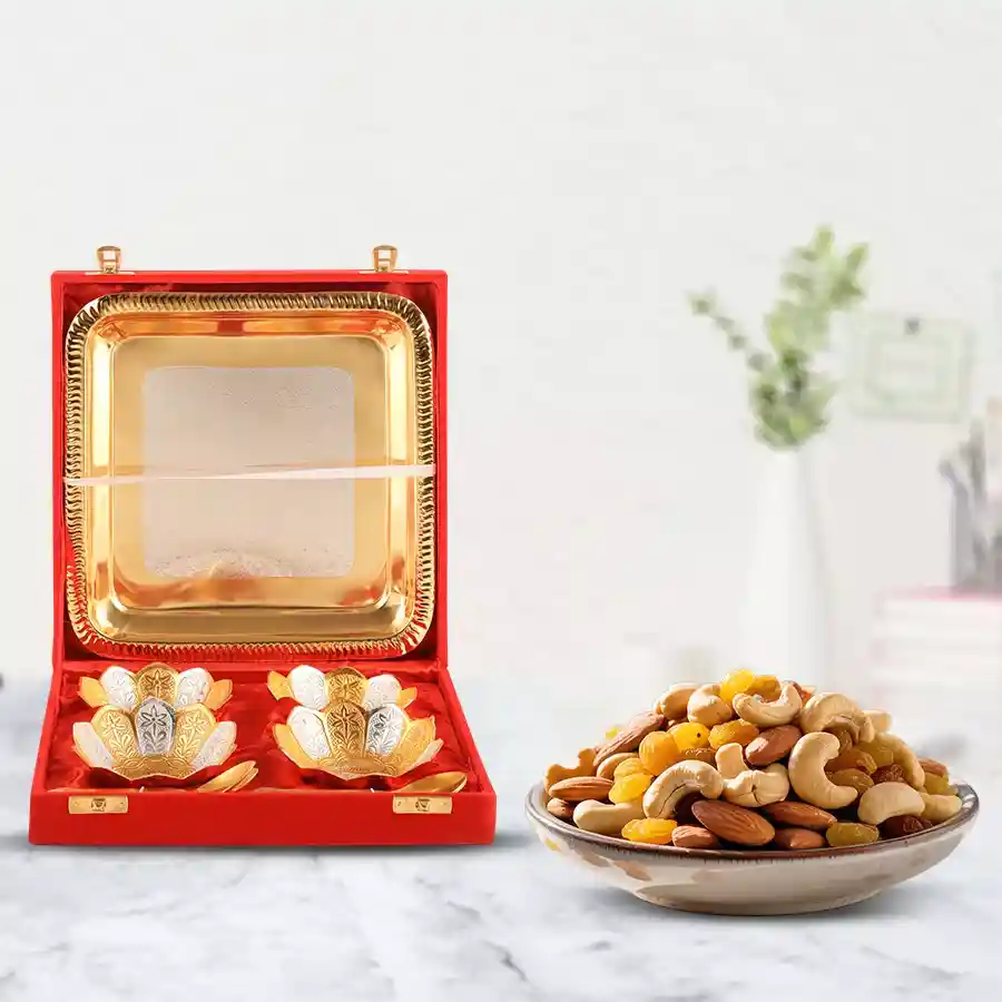 Elegant silver bowl set with tasty dry fruits in a red gift box, perfect for Mother's Day.