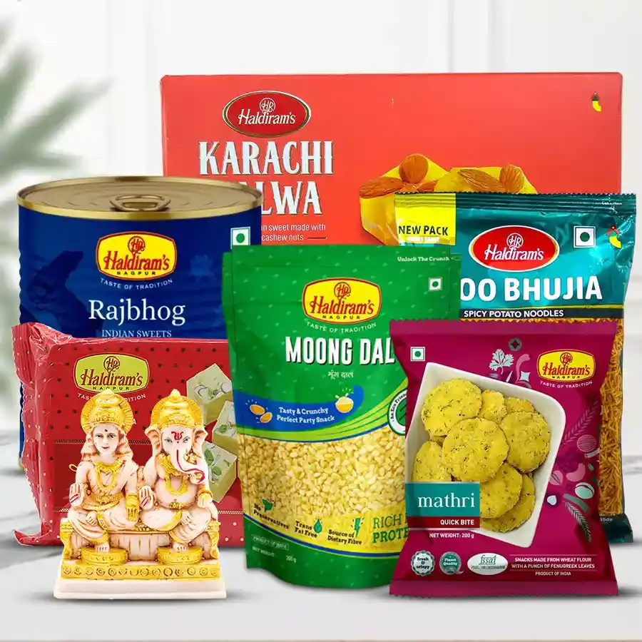 Laxmi Ganesh idol with Haldirams Diwali mithai and snacks assortment in a festive gift pack