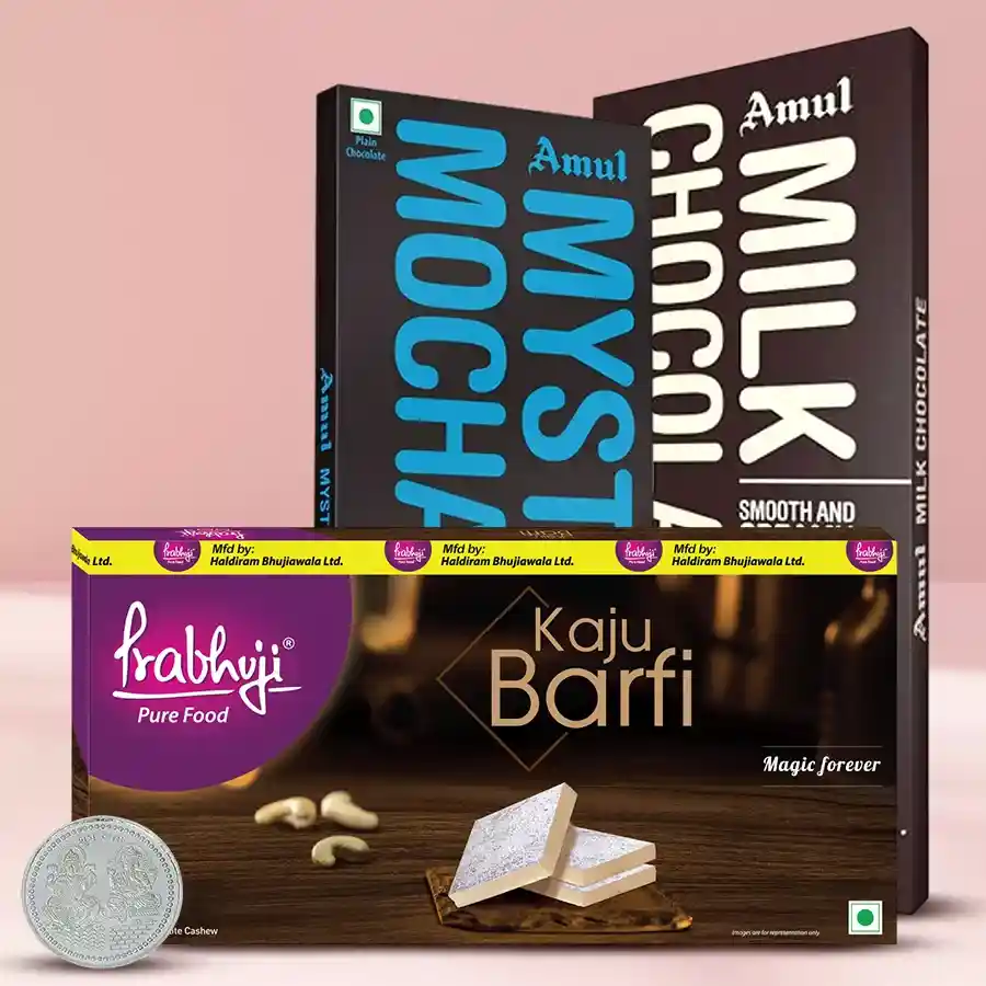 Tasty Diwali Treat box featuring Amul Milk, Mystic Mocha chocolates, Haldiram Prabhuji Kaju Barfi, and a silver-plated Laxmi Ganesh coin.