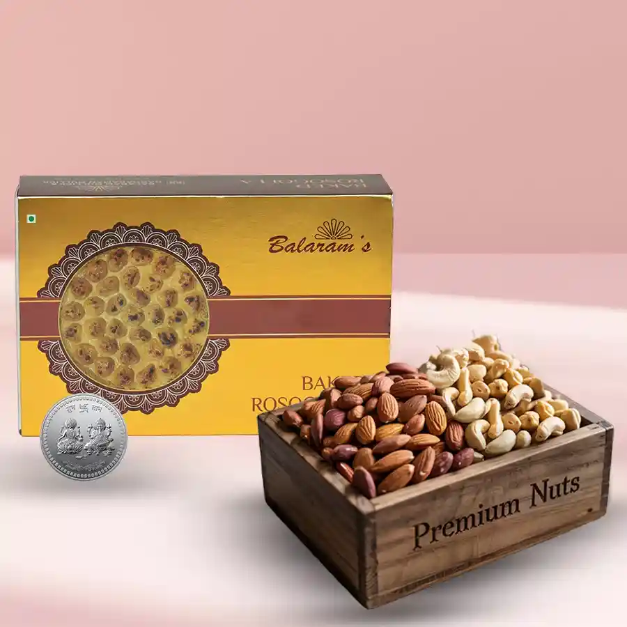 Balaram Mullick Baked Rassogolla and Dry Fruits Combo in an elegant wooden box with a silver-plated Laxmi Ganesh coin