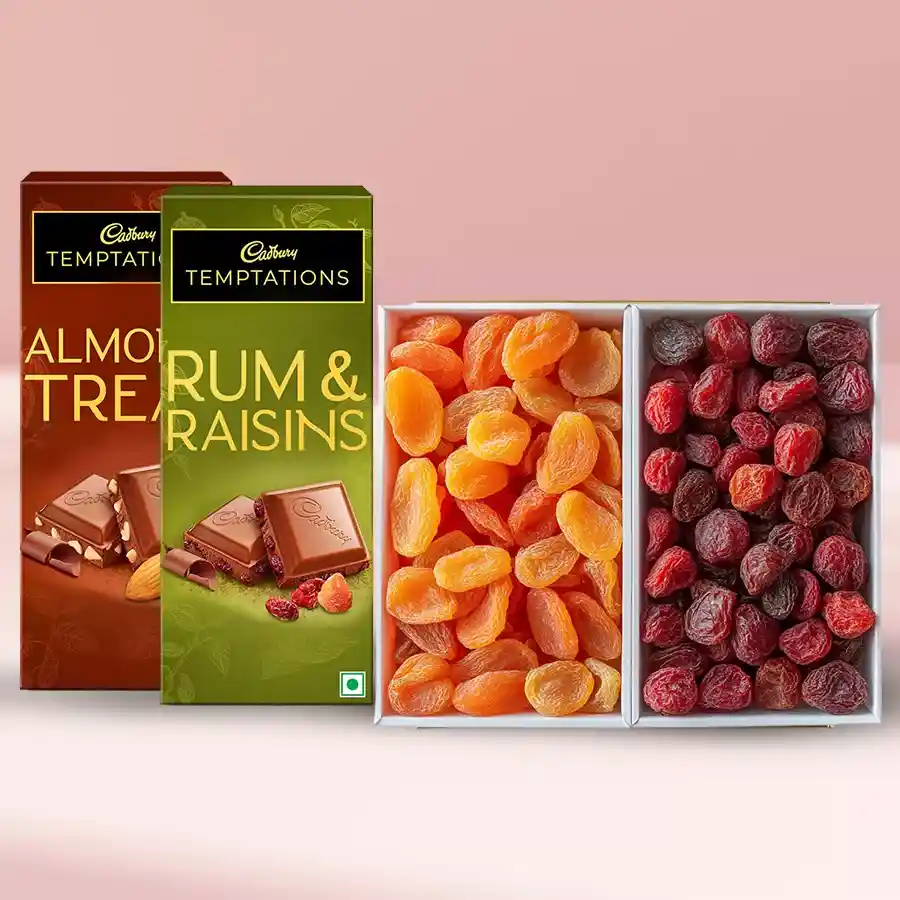 Zesty dried strawberries and apricots paired with two Cadbury Temptation bars in a wooden box for Deepawali celebration