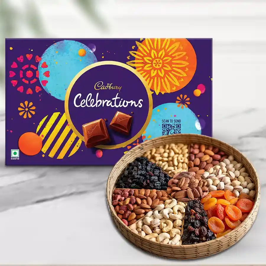 A beautiful round basket filled with an assortment of premium dry fruits and a pack of Cadbury Celebrations chocolates, perfect for Diwali gifting.