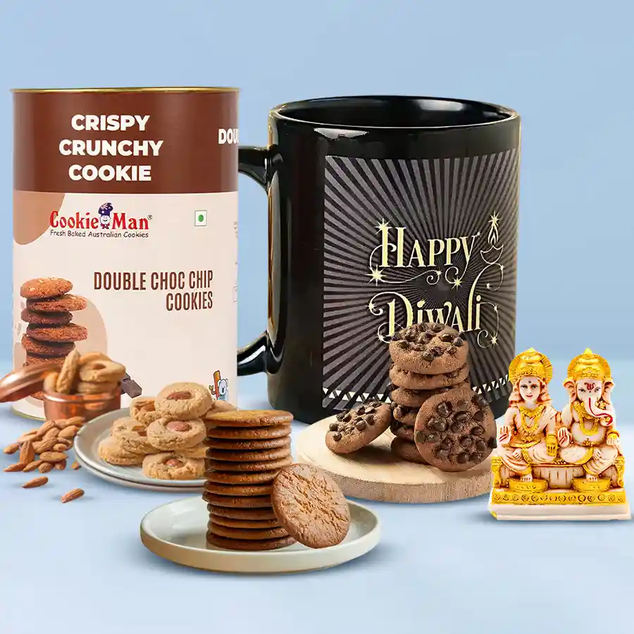 Zesty Cookie Delight gift hamper featuring a personalized Happy Diwali black coffee mug, assorted cookies, and a Laxmi Ganesh idol
