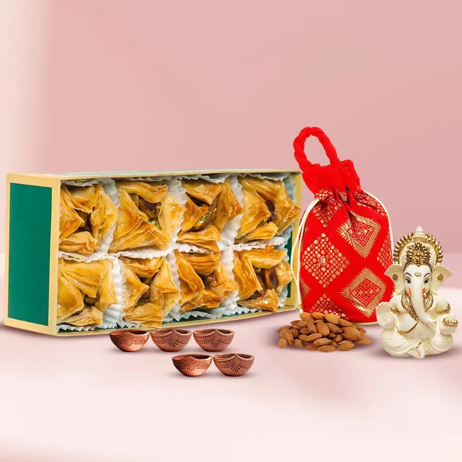 Tasty Pyramid Baklawa set with almond potli, Ganesha idol, and five Matka Diyas