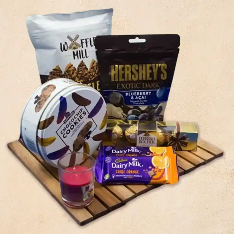 Luscious Chocolate and Cookies Combo arranged in a stylish wooden tray with chocolates, cookies, and candles for Deepawali celebrations.