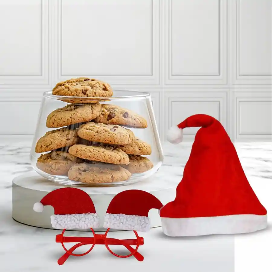 Lovely Xmas Party Accessories and Double Choc Chip Cookies for Kids, featuring colorful cap, fun band, playful goggles, and a pack of rich cookies.