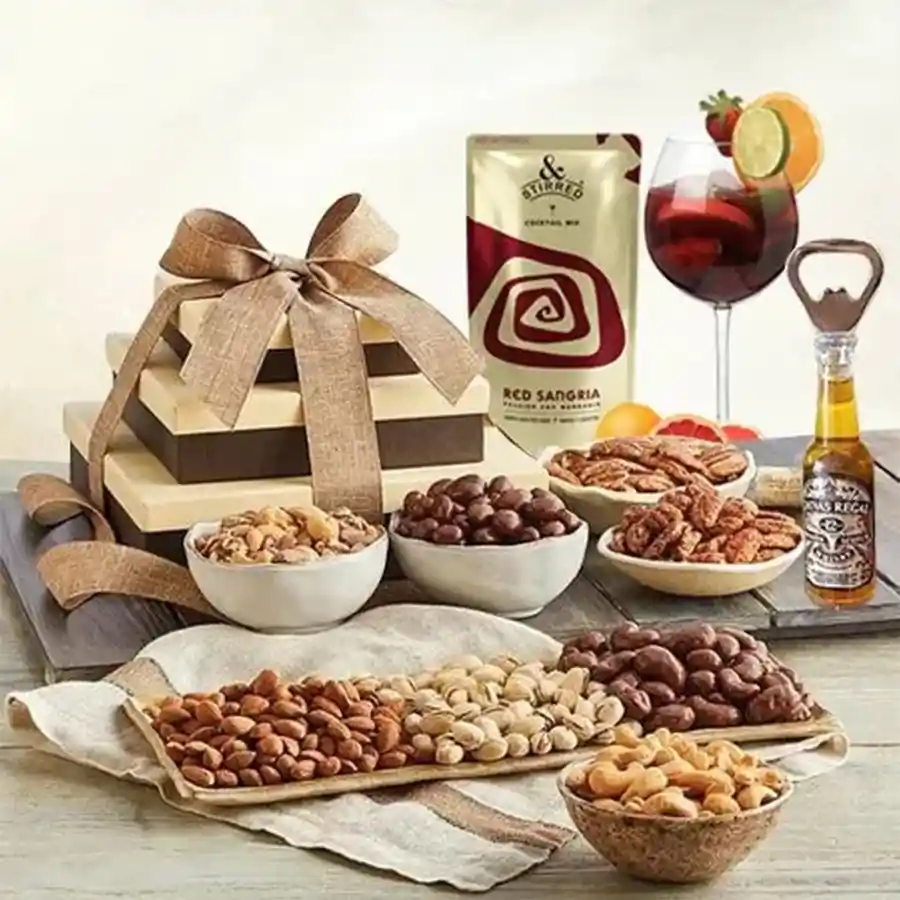 Quirky Xmas Gift Tower featuring dried nuts, Red Sangria Cocktail Mix, wine bottle opener, and two wine glasses